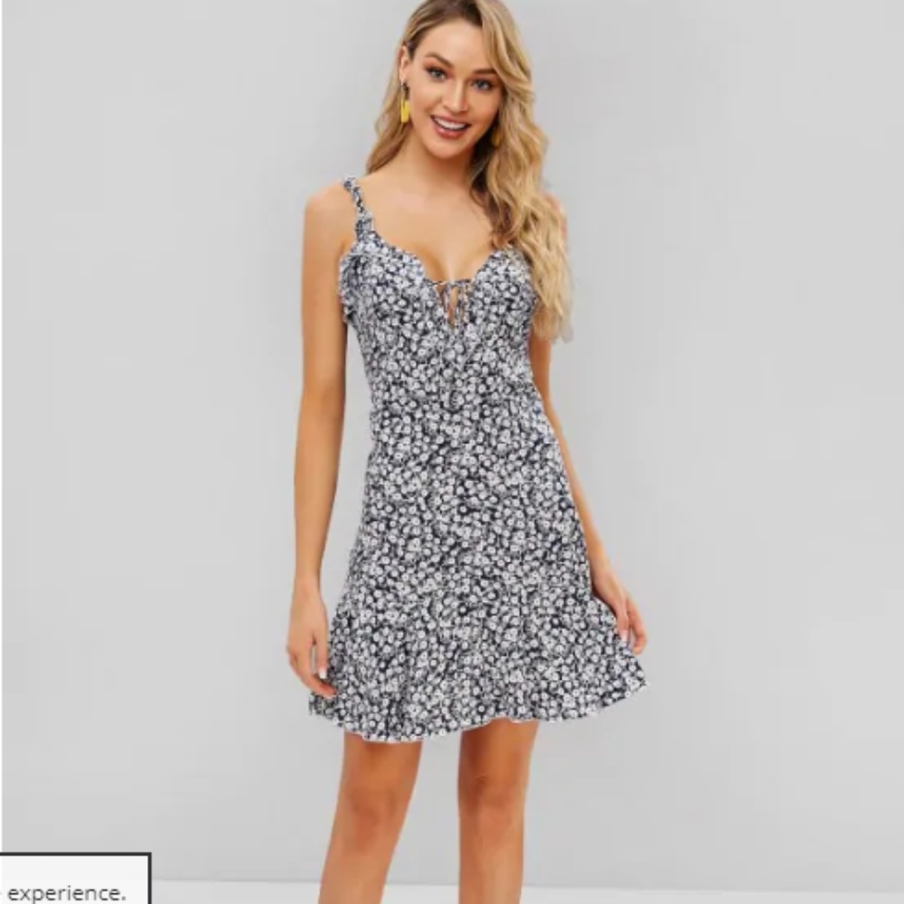 Skinny strap black dress with small white pattern